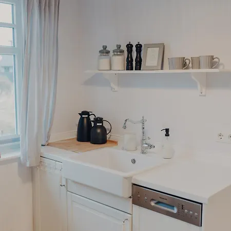 Friedas Hus Апартаменты Бюзум